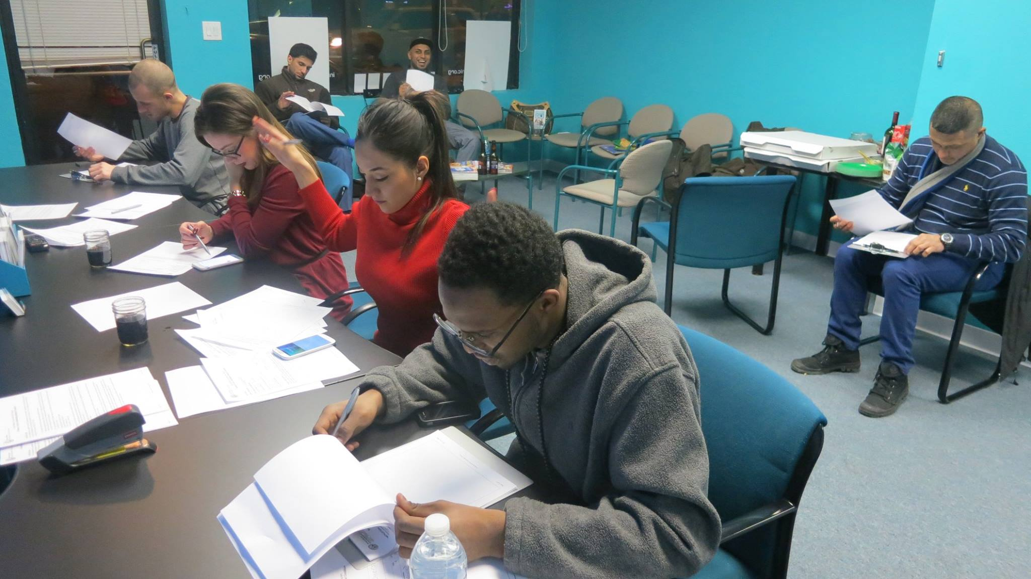 Community members participating in The Healing Clinic’s January 2015 petition event.