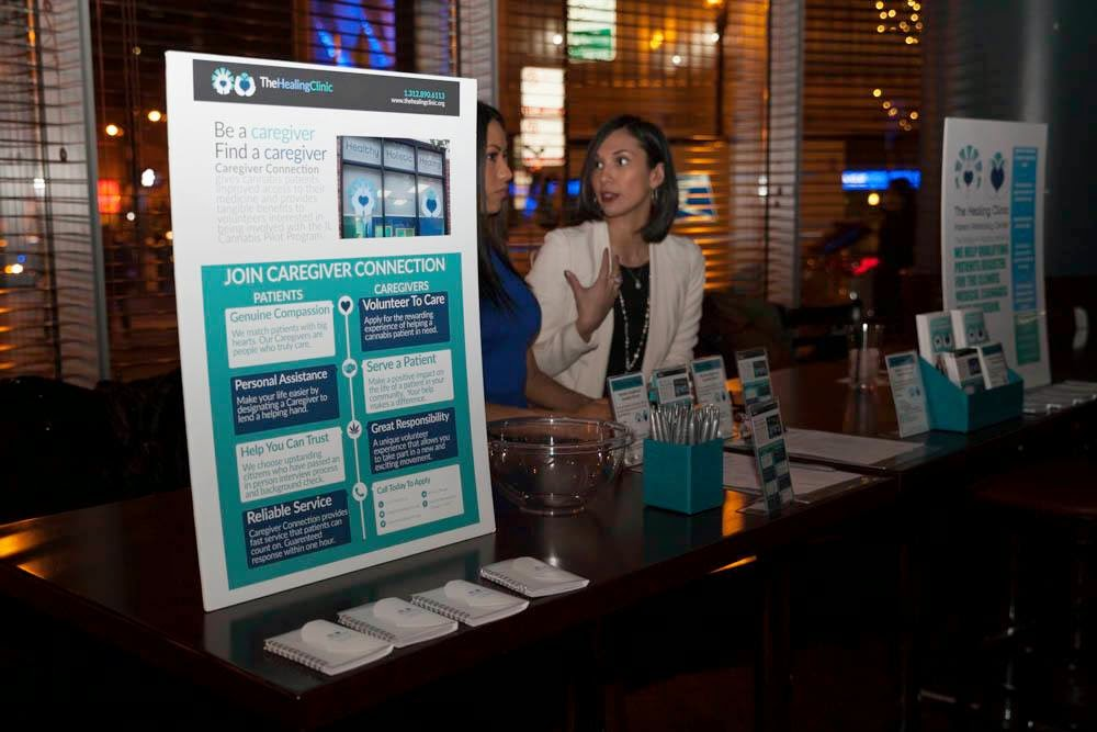 Feliza Castro and community members during The Healing Clinic’s February 2015 petition outreach.
