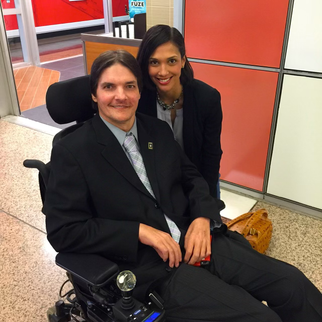 Feliza Castro beside patient advocate Jim Champion at an Illinois medical cannabis petition hearing.